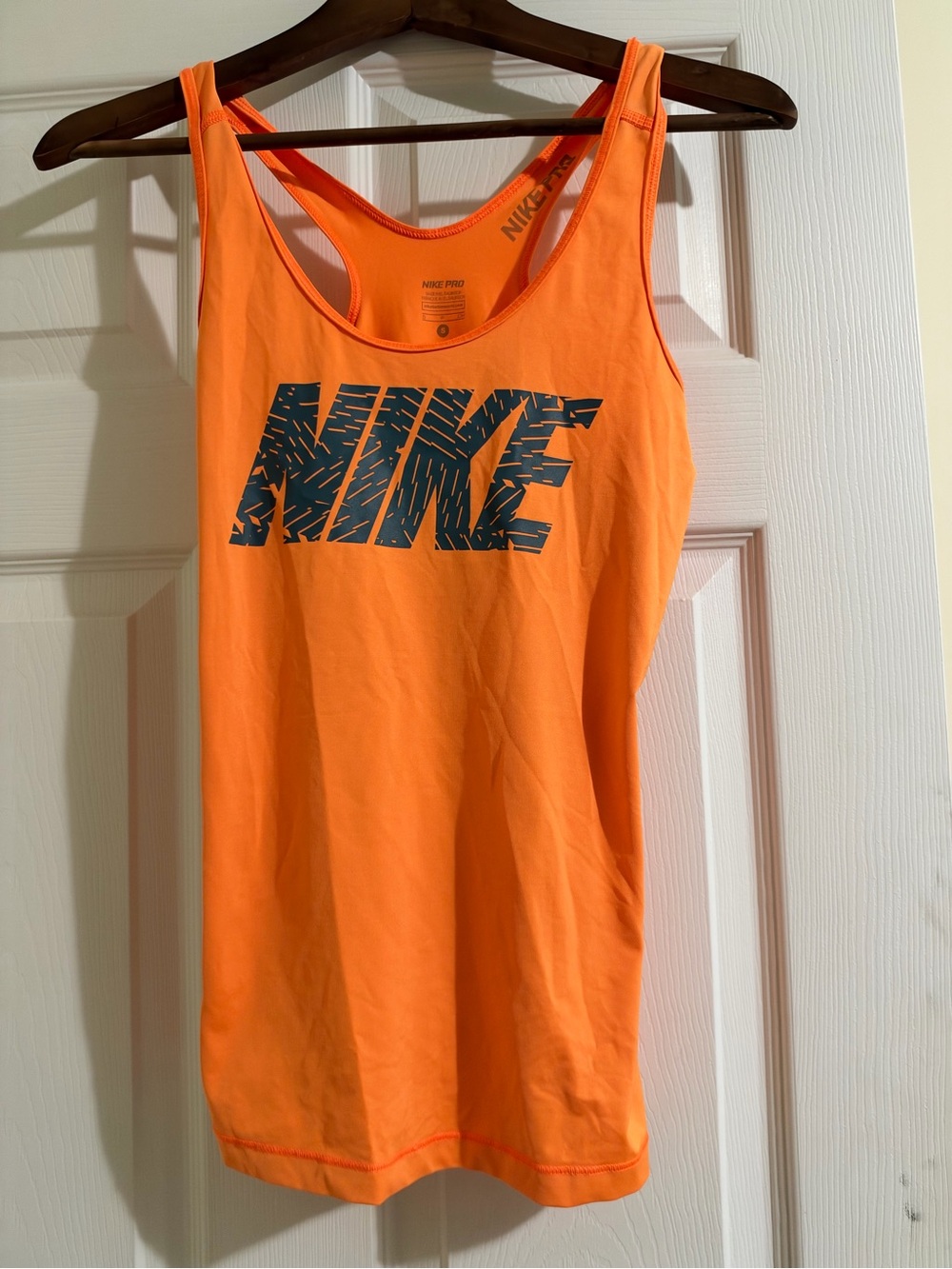 Nike Women's Neon Orange Racerback Tank with Navy Logo